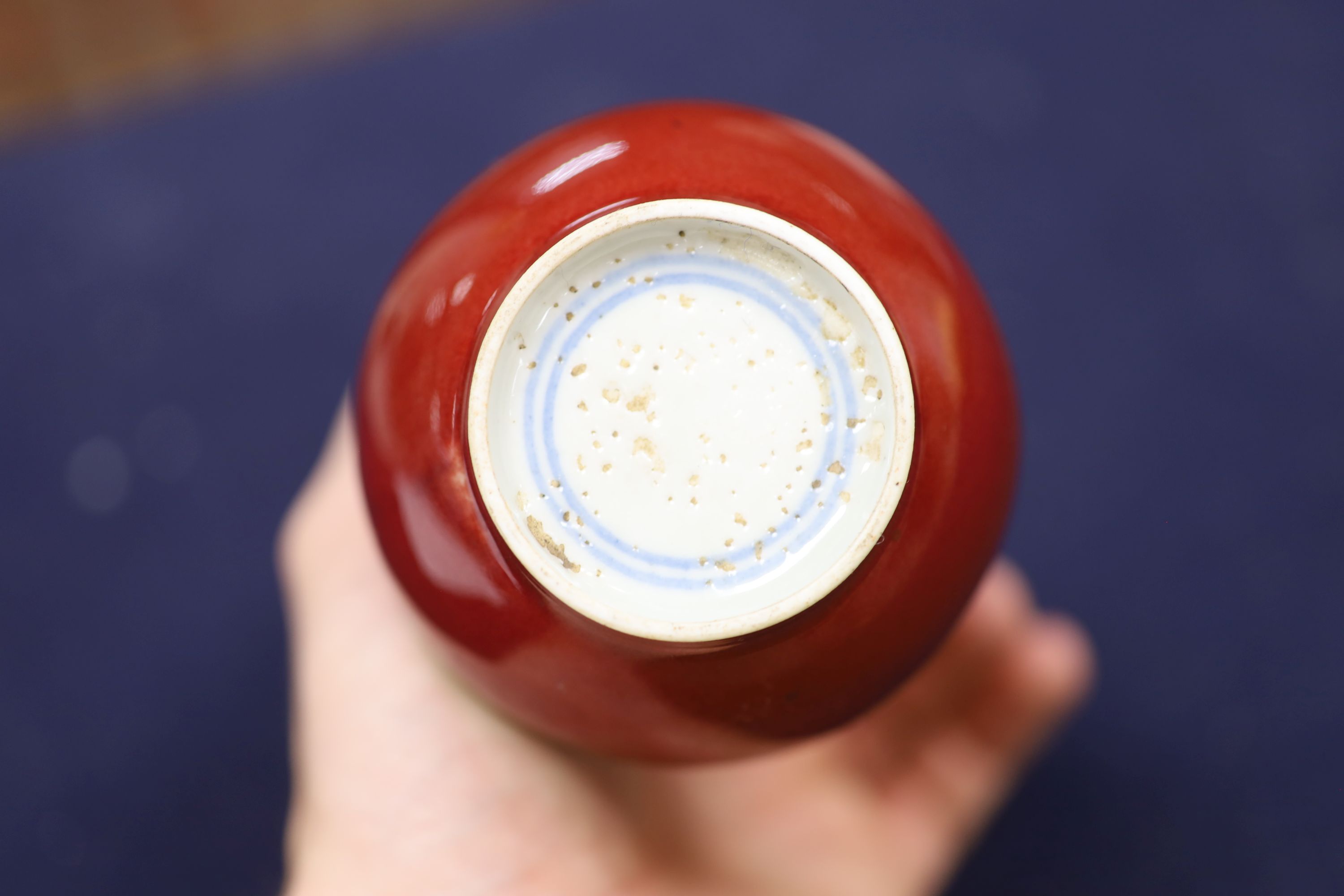A Chinese copper red glazed double gourd vase, height 17cm